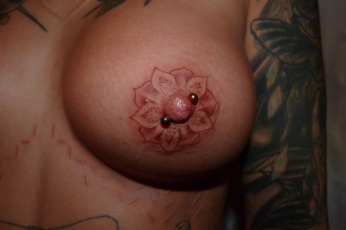 nipple tattoo piercing